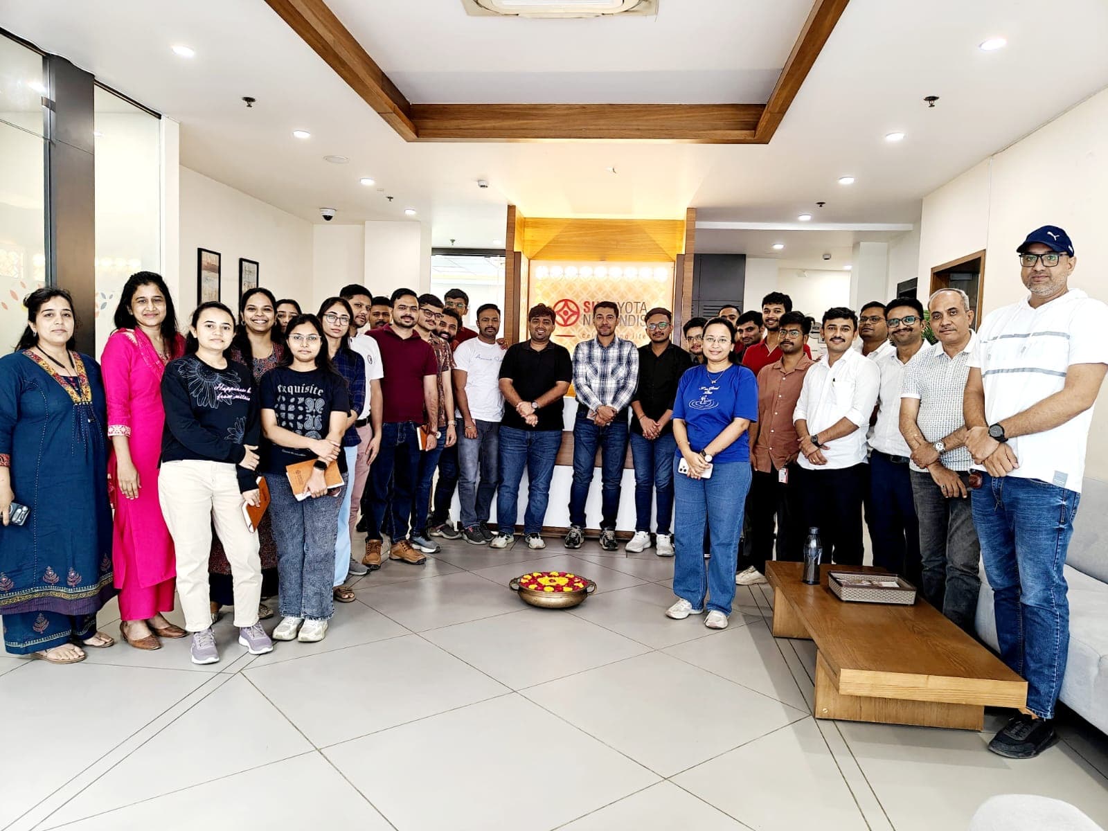 The office batch of the Sundyota Numandis AI training, at the company’s Ahmedabad reception